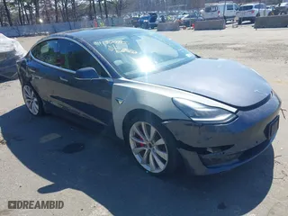 2019 Tesla Model 3 Long Range with VIN 5YJ3E1EBXKF441301, listed as a IAAI auction lot 41900995 with 55,235 mi miles. Bid and sale history available at carsss.com. Image 1.