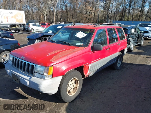 1997 Jeep Grand Cherokee Laredo with VIN 1J4GZ58S0VC550242, listed as a IAAI auction lot 41032114 with 185,307 mi miles. Bid and sale history available at carsss.com. Image 17.