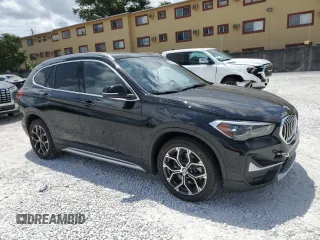 2021 BMW X1 xDrive28i z VIN WBXJG9C08M5T59270, wystawiony jako Copart lot #53894475 z przebiegiem 36 824 mil mil oraz Nie do naprawy • Non repairable. Historia ofert i sprzedaży dostępna na DreamBid. Obrazek 4.