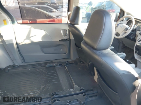 2014 Toyota Sienna SE with VIN 5TDXK3DC1ES462473, listed as a IAAI auction lot 41811437 with 209,704 mi miles and . Bid and sale history available at DreamBid. Image 8.