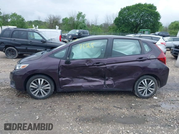 2015 Honda Fit EX-L z VIN 3HGGK5H84FM734308, wystawiony jako IAAI lot #42572565 z przebiegiem 130 513 mil mil oraz . Historia ofert i sprzedaży dostępna na DreamBid. Obrazek 14.