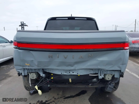 2023 Rivian R1T Launch Edition with VIN 7FCTGAAL3PN017339, listed as a IAAI auction lot 42041423 with 15,098 mi miles. Bid and sale history available at carsss.com. Image 6.