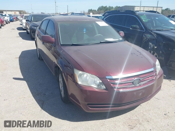 2007 Toyota Avalon XL z VIN 4T1BK36B97U205988, wystawiony jako IAAI lot #41738847 z przebiegiem 99 951 mil mil oraz . Historia ofert i sprzedaży dostępna na DreamBid. Obrazek 1.