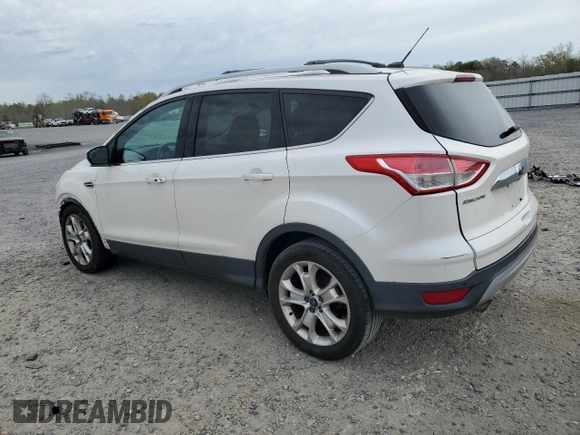 2016 Ford Escape Titanium with VIN 1FMCU9JX6GUB85980, listed as a Copart auction lot 51748715 with 129,537 mi miles and Salvage Title. Bid and sale history available at carsss.com. Image 2.