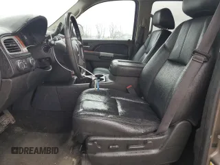 2013 Chevrolet Suburban LT with VIN 1GNSKJE77DR131188, listed as a Copart auction lot 52880375 with 147,278 mi miles and Salvage Title. Bid and sale history available at DreamBid. Image 7.