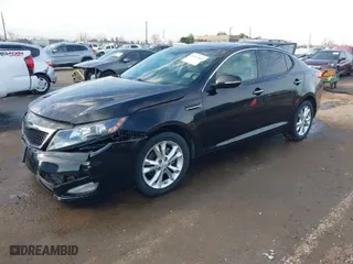 2012 Kia Optima EX with VIN 5XXGN4A7XCG083149, listed as a IAAI auction lot 41643843 with 131,726 mi miles. Bid and sale history available at carsss.com. Image 2.