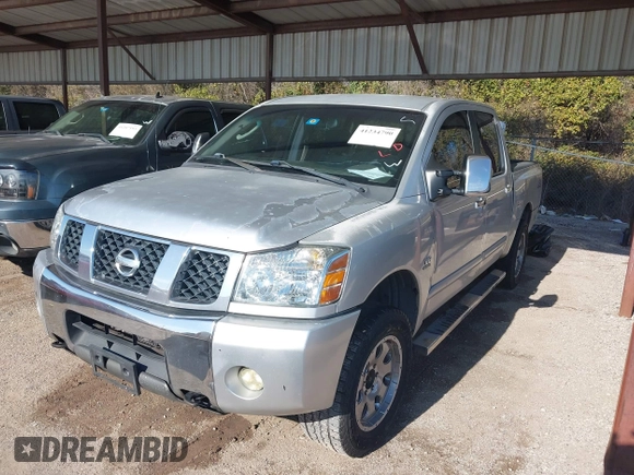 2004 Nissan Titan LE z VIN 1N6AA07BX4N537229, wystawiony jako IAAI lot #41234790 z przebiegiem 210 475 mil mil oraz . Historia ofert i sprzedaży dostępna na DreamBid. Obrazek 2.