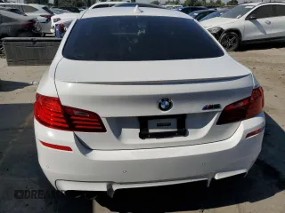 2014 BMW M5 with VIN WBSFV9C57ED097570, listed as a Copart auction lot 88571785 with 100,391 mi miles and Salvage Title. Bid and sale history available at carsss.com. Image 6.