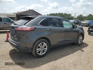2020 Ford Edge SEL с VIN 2FMPK3J92LBA30123, выставлен на аукционе Copart как лот 63192805 с пробегом 119 534 миль миль и Списание • Salvage title. История ставок и продаж доступна на DreamBid. Изображение 3.
