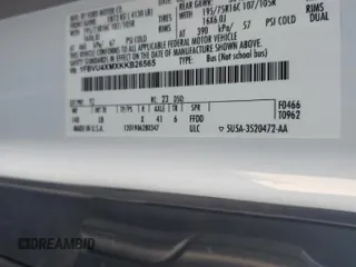 2019 Ford Transit Passenger XL with VIN 1FBVU4XMXKKB26565, listed as a Copart auction lot 70501504 with 82,291 mi miles and Salvage Title. Bid and sale history available at DreamBid. Image 14.