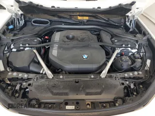 2024 BMW 7 Series 740i xDrive with VIN WBA33EH05RCR68996, listed as a Copart auction lot 73118674 with 14,266 mi miles and Salvage Title. Bid and sale history available at carsss.com. Image 11.