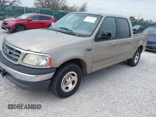 2001 Ford F-150 XLT with VIN 1FTRW07W01KB64001, listed as a IAAI auction lot 41903682 with 175,396 mi miles and . Bid and sale history available at DreamBid. Image 2.
