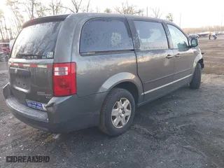 2010 Dodge Grand Caravan SE with VIN 2D4RN4DE7AR397092, listed as a IAAI auction lot 41084684 with 117,747 mi miles. Bid and sale history available at carsss.com. Image 4.