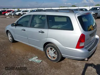 2001 Ford Focus SE z VIN 1FAFP363X1W343475, wystawiony jako IAAI lot #42390133 z przebiegiem 127 282 mil mil oraz . Historia ofert i sprzedaży dostępna na DreamBid. Obrazek 3.