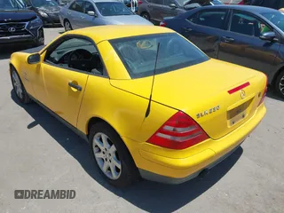 1999 Mercedes-Benz SLK 230/320 with VIN WDBKK47F7XF131839, listed as a IAAI auction lot 42648299 with 124,630 mi miles and . Bid and sale history available at DreamBid. Image 3.
