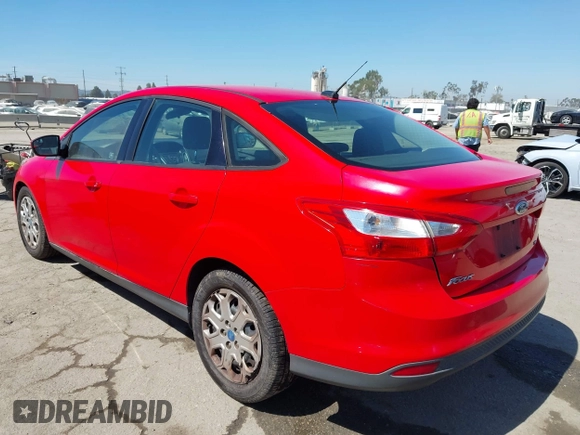 2012 Ford Focus SE z VIN 1FAHP3F21CL177044, wystawiony jako IAAI lot #42702897 z przebiegiem 189 898 mil mil oraz . Historia ofert i sprzedaży dostępna na DreamBid. Obrazek 3.