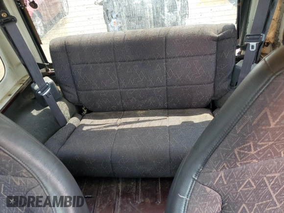 2002 Jeep Wrangler X with VIN 1J4FA39SX2P732881, listed as a Copart auction lot 64451185 with Not provided miles and Clean title. Bid and sale history available at DreamBid. Image 10.