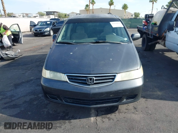 2002 Honda Odyssey EX with VIN 2HKRL18632H512158, listed as a IAAI auction lot 42354621 with 240,373 mi miles and . Bid and sale history available at DreamBid. Image 12.