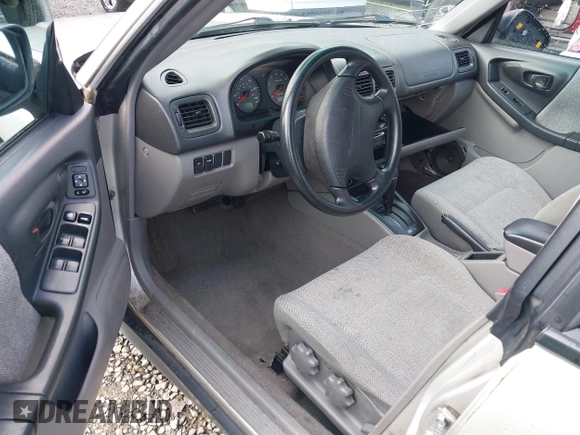 2001 Subaru Forester L with VIN JF1SF635X1H735028, listed as a IAAI auction lot 41805026 with 132,843 mi miles. Bid and sale history available at carsss.com. Image 5.