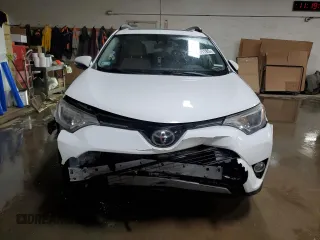 2017 Toyota RAV4 XLE with VIN JTMWFREV7HJ701268, listed as a Copart auction lot 49098185 with 79,314 mi miles and Salvage Title. Bid and sale history available at DreamBid. Image 5.