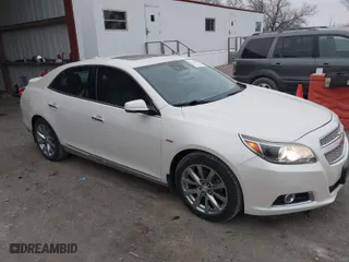 2013 Chevrolet Malibu LTZ with VIN 1G11H5SA7DF127467, listed as a IAAI auction lot 41192477 with 138,344 mi miles. Bid and sale history available at carsss.com. Image 1.