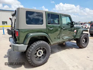 2008 Jeep Wrangler Unlimited Sahara with VIN 1J4GA59148L608970, listed as a Copart auction lot 64433495 with 134,055 mi miles and Salvage title. Bid and sale history available at DreamBid. Image 3.