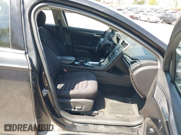 2015 Ford Fusion SE with VIN 3FA6P0H77FR221343, listed as a IAAI auction lot 42076089 with 136,812 mi miles. Bid and sale history available at carsss.com. Image 5.