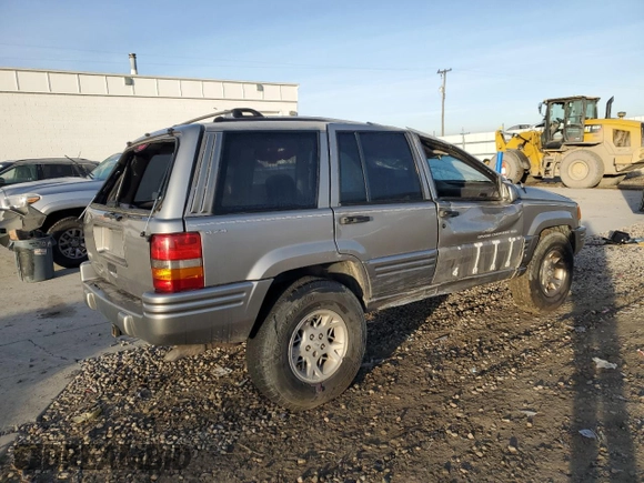 1998 Jeep Grand Cherokee Limited с VIN 1J4GZ78Y0WC260231, выставлен на аукционе Copart как лот 85149724 с пробегом 203 258 миль миль и Списание • Salvage title. История ставок и продаж доступна на DreamBid. Изображение 3.