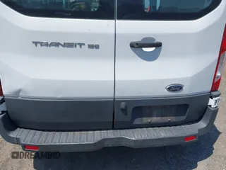 2018 Ford Transit with VIN 1FTYE1ZM3JKA22788, listed as a IAAI auction lot 42298271 with 325,277 mi miles and . Bid and sale history available at DreamBid. Image 18.
