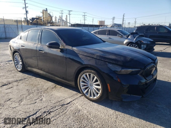 2024 BMW i5 eDrive40 with VIN WBY33FK03RCR92861, listed as a Copart auction lot 88443755 with 13,138 mi miles and Salvage title. Bid and sale history available at DreamBid. Image 4.