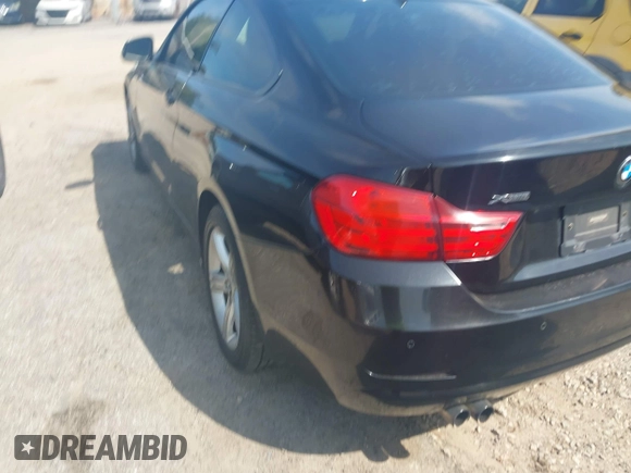 2014 BMW 4 Series 428i xDrive with VIN WBA3N5C52EF716998, listed as a IAAI auction lot 42548467 with 212,418 mi miles and . Bid and sale history available at DreamBid. Image 3.