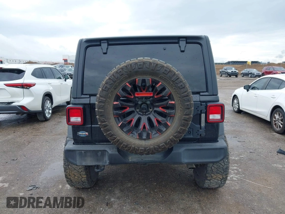 2022 Jeep Wrangler Unlimited Sport S z VIN 1C4HJXDG0NW133801, wystawiony jako IAAI lot #41908846 z przebiegiem 44 743 mil mil oraz . Historia ofert i sprzedaży dostępna na DreamBid. Obrazek 16.
