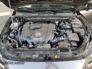 2018 Mazda 3 Touring z VIN 3MZBN1L30JM195471, wystawiony jako Copart lot #57497115 z przebiegiem 147 899 mil mil oraz Szkoda całkowita • Salvage title. Historia ofert i sprzedaży dostępna na DreamBid. Obrazek 11.