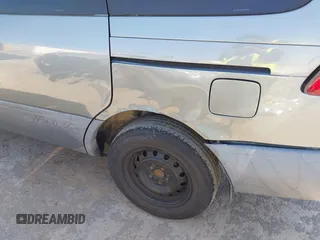 1999 Toyota Sienna LE with VIN 4T3ZF13C8XU109975, listed as a IAAI auction lot 42701961 with 194,529 mi miles and . Bid and sale history available at DreamBid. Image 6.