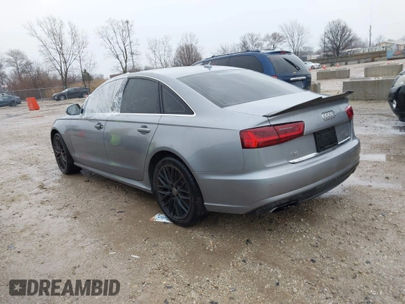 2016 Audi A6 2.0T Premium Plus with VIN WAUGFAFC1GN014536, listed as a IAAI auction lot 41937616 with 122,417 mi miles. Bid and sale history available at carsss.com. Image 3.