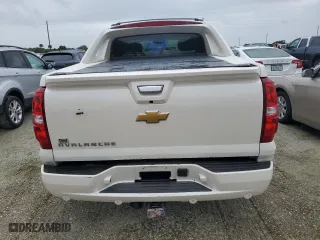 2013 Chevrolet Avalanche LTZ with VIN 3GNMCGE0XDG368091, listed as a Copart auction lot 73945984 with 0 mi miles and Salvage Title. Bid and sale history available at carsss.com. Image 6.