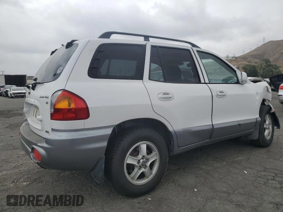 2002 Hyundai Santa Fe GLS with VIN KM8SC73D02U311622, listed as a Copart auction lot 71742874 with 99,807 mi miles and Salvage Title. Bid and sale history available at carsss.com. Image 3.