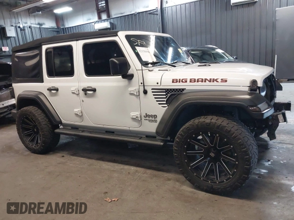 2019 Jeep Wrangler Unlimited Sport S z VIN 1C4HJXDG4KW639403, wystawiony jako IAAI lot #42158096 z przebiegiem 132 569 mil mil oraz . Historia ofert i sprzedaży dostępna na DreamBid. Obrazek 14.