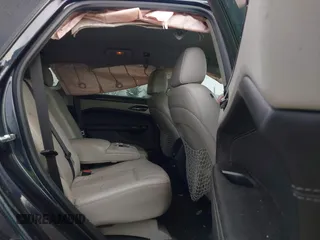 2014 Cadillac SRX with VIN 3GYFNAE38ES659362, listed as a IAAI auction lot 41971537 with 115,379 mi miles and . Bid and sale history available at DreamBid. Image 8.