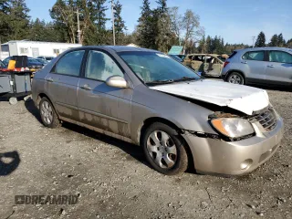 2006 Kia Spectra EX with VIN KNAFE122X65278395, listed as a Copart auction lot 51773205 with 243,978 mi miles and Salvage Title. Bid and sale history available at carsss.com. Image 4.