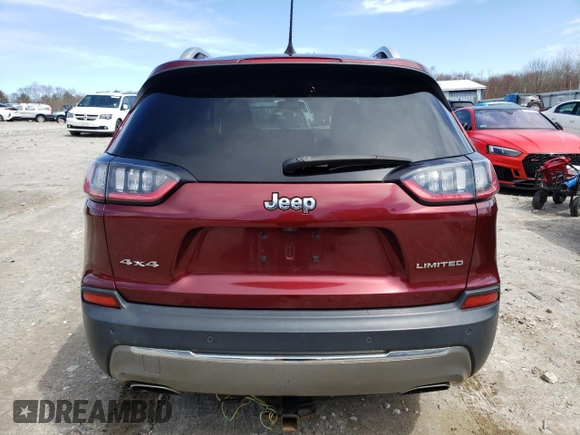 2019 Jeep Cherokee Limited with VIN 1C4PJMDX9KD231050, listed as a Copart auction lot 52769005 with 180,645 mi miles and Salvage Title. Bid and sale history available at carsss.com. Image 6.