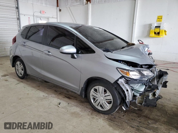 2018 Honda Fit LX with VIN 3HGGK5G45JM733837, listed as a Copart auction lot 51059765 with 81,357 mi miles and Non Repairable. Bid and sale history available at DreamBid. Image 4.