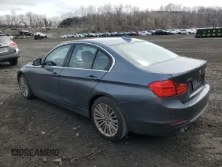 2015 BMW 3 Series 328i xDrive with VIN WBA3B5G53FNS12387, listed as a Copart auction lot 51802455 with 93,173 mi miles and Salvage Title. Bid and sale history available at carsss.com. Image 2.