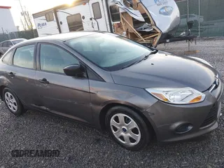 2013 Ford Focus S with VIN 1FADP3E20DL156901, listed as a IAAI auction lot 41784334 with 190,821 mi miles. Bid and sale history available at carsss.com. Image 6.