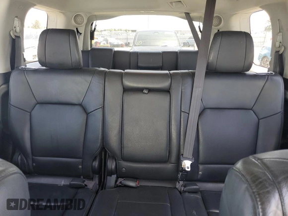 2014 Honda Pilot Touring z VIN 5FNYF4H9XEB047993, wystawiony jako Copart lot #57518705 z przebiegiem 159 809 mil mil oraz Szkoda całkowita • Salvage title. Historia ofert i sprzedaży dostępna na DreamBid. Obrazek 10.