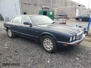 2001 Jaguar XJ with VIN SAJDA14C41LF38763, listed as a Copart auction lot 86796434 with 60,076 mi miles and Clean Title. Bid and sale history available at carsss.com. Image 4.