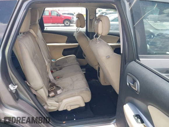 2013 Dodge Journey SE with VIN 3C4PDCAB3DT626929, listed as a IAAI auction lot 42318702 with Not provided miles and . Bid and sale history available at DreamBid. Image 8.