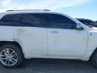 2015 Jeep Grand Cherokee Overland with VIN 1C4RJFCG3FC230185, listed as a IAAI auction lot 42494650 with 123,128 mi miles and . Bid and sale history available at DreamBid. Image 13.