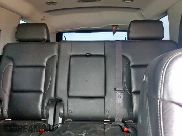 2015 Chevrolet Tahoe LT with VIN 1GNSKBKC1FR139281, listed as a Copart auction lot 57583595 with 142,090 mi miles and Salvage title. Bid and sale history available at DreamBid. Image 10.