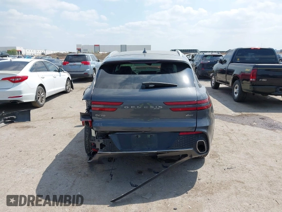 2023 Genesis GV70 2.5T with VIN KMUMADTB9PU084936, listed as a IAAI auction lot 42040232 with 28,201 mi miles and . Bid and sale history available at DreamBid. Image 16.